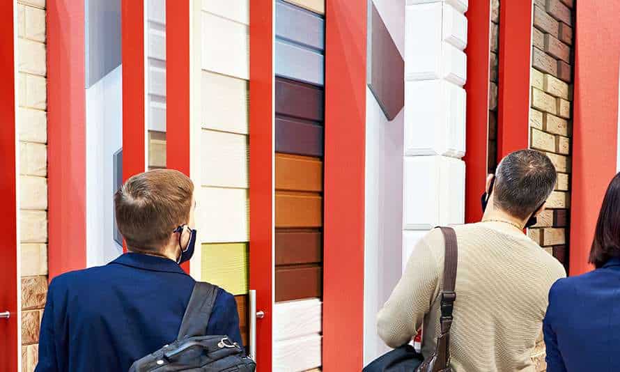 People Shopping for Vinyl Siding at a Store