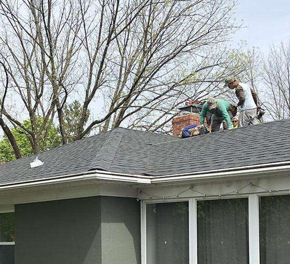 First Rate Roofing - Team Finishing Up a Roofing Project