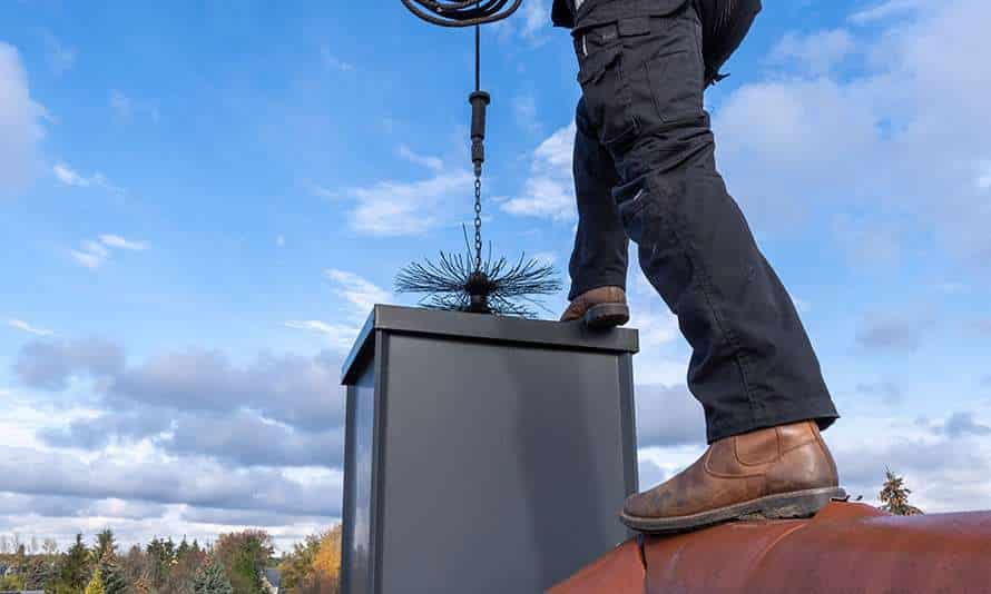 Chimney Expert Cleaning a Chimney