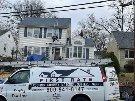 First Rate Roofing and Chimney Team on Site